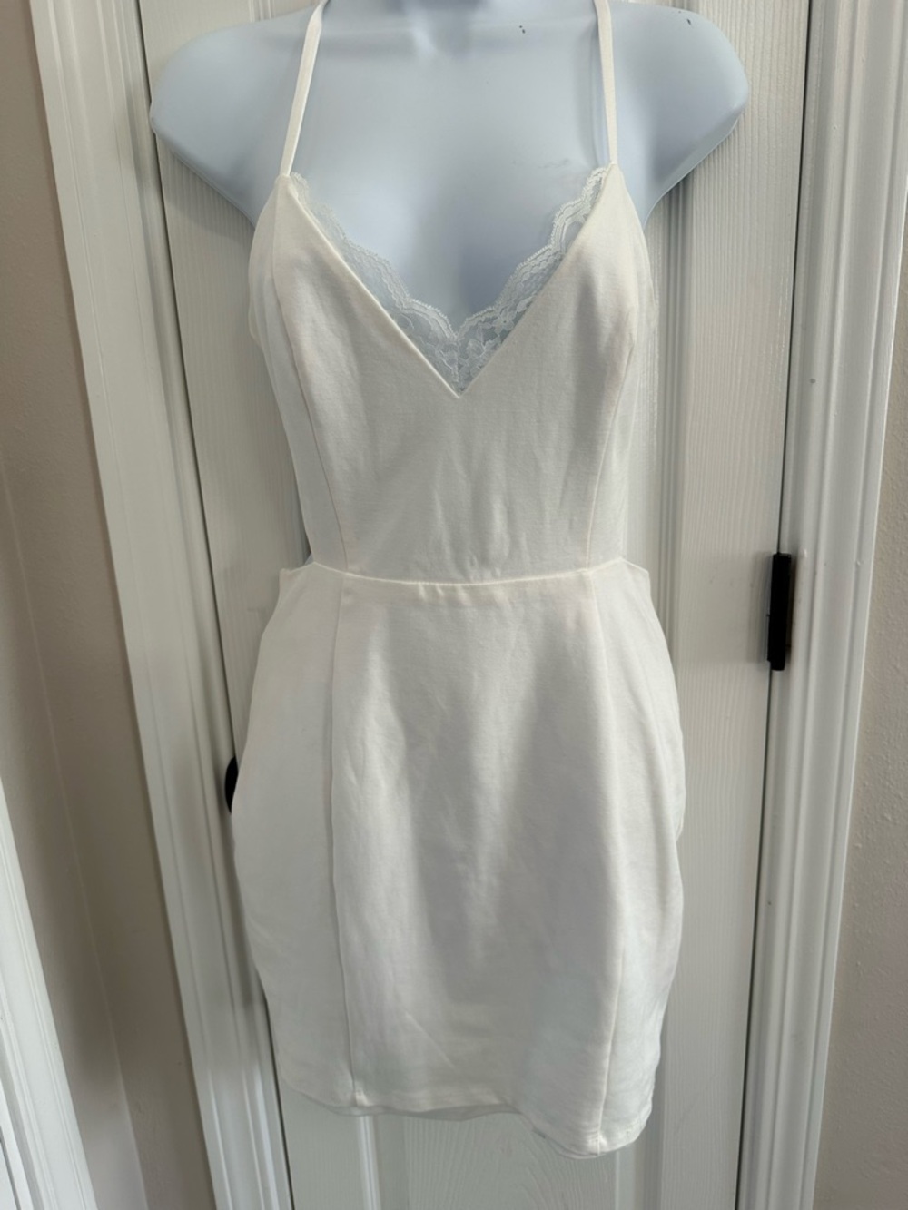 Lulu's Black Logo Label on White Fabric